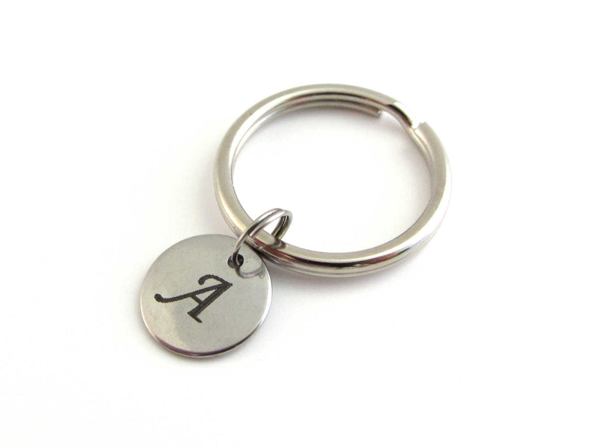 http://www.purplewyvernjewels.com/cdn/shop/products/Initial-Letter-Charm-Keychain-KNC188_1200x1200.jpg?v=1621959135